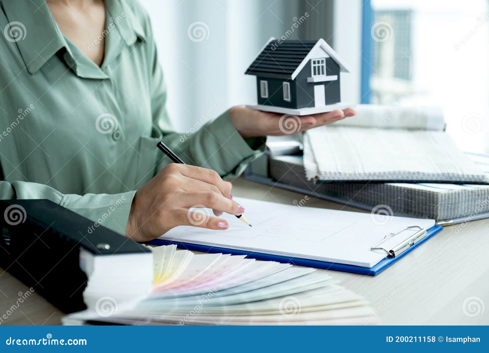 Property and Interior Agents are Presenting Houses and Curtains for