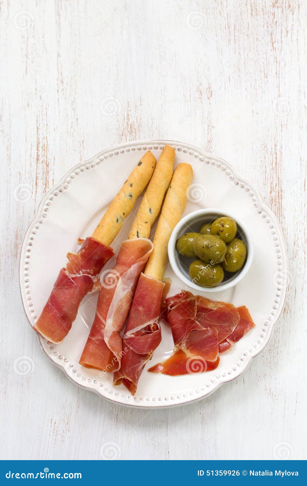 Prosciutto with olives stock photo. Image of food, cooked 51359926