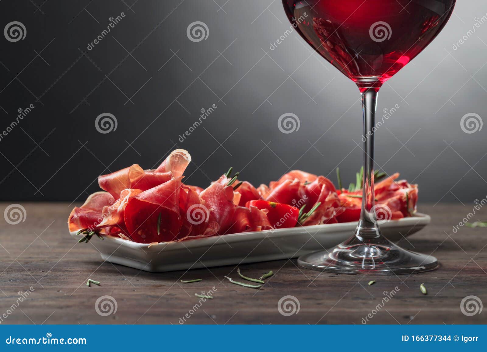 Prosciutto with Rosemary and Glass of Red Wine Stock Photo Image of