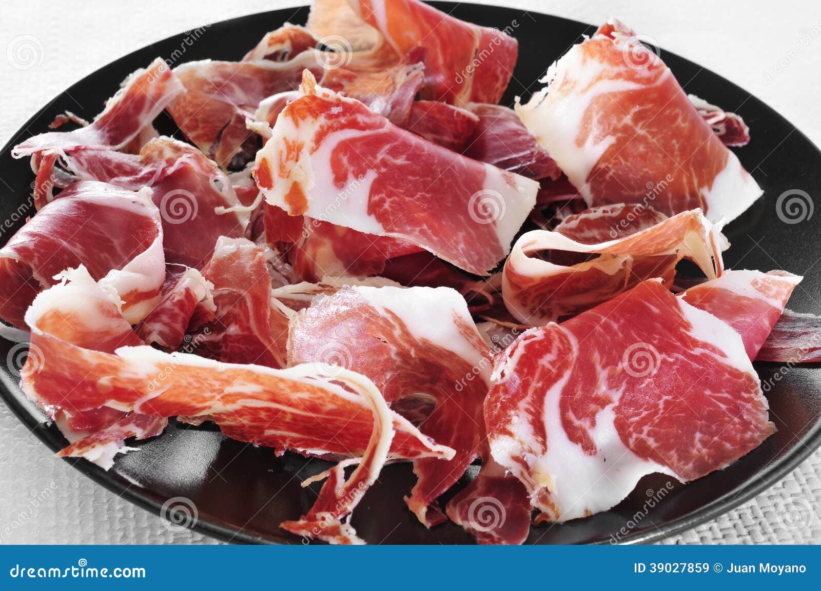 Prosciutto Spagnolo Di Serrano Servito Da Tapas Immagine Stock