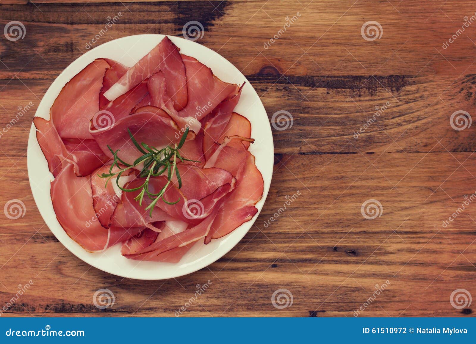 Prosciutto on white plate stock photo. Image of jamon - 61510972
