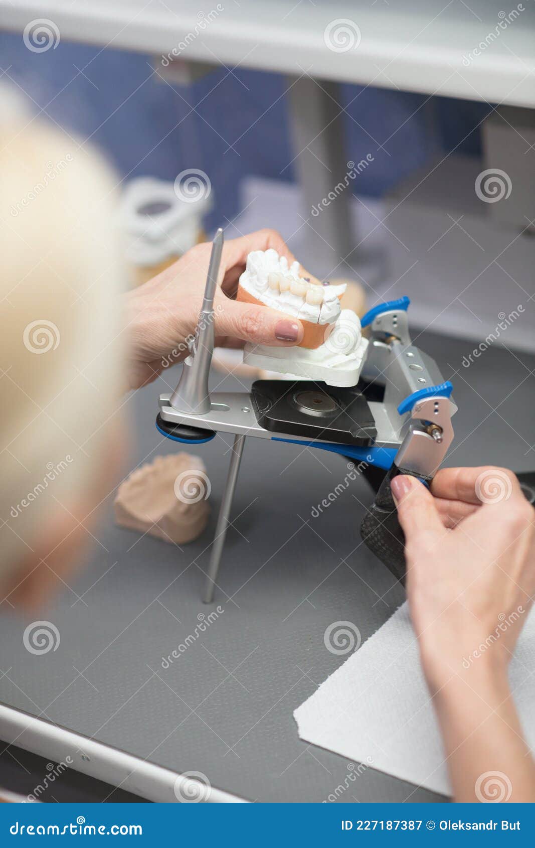 Prosthetist Working with Equipment at the Dental Clinic Stock Image