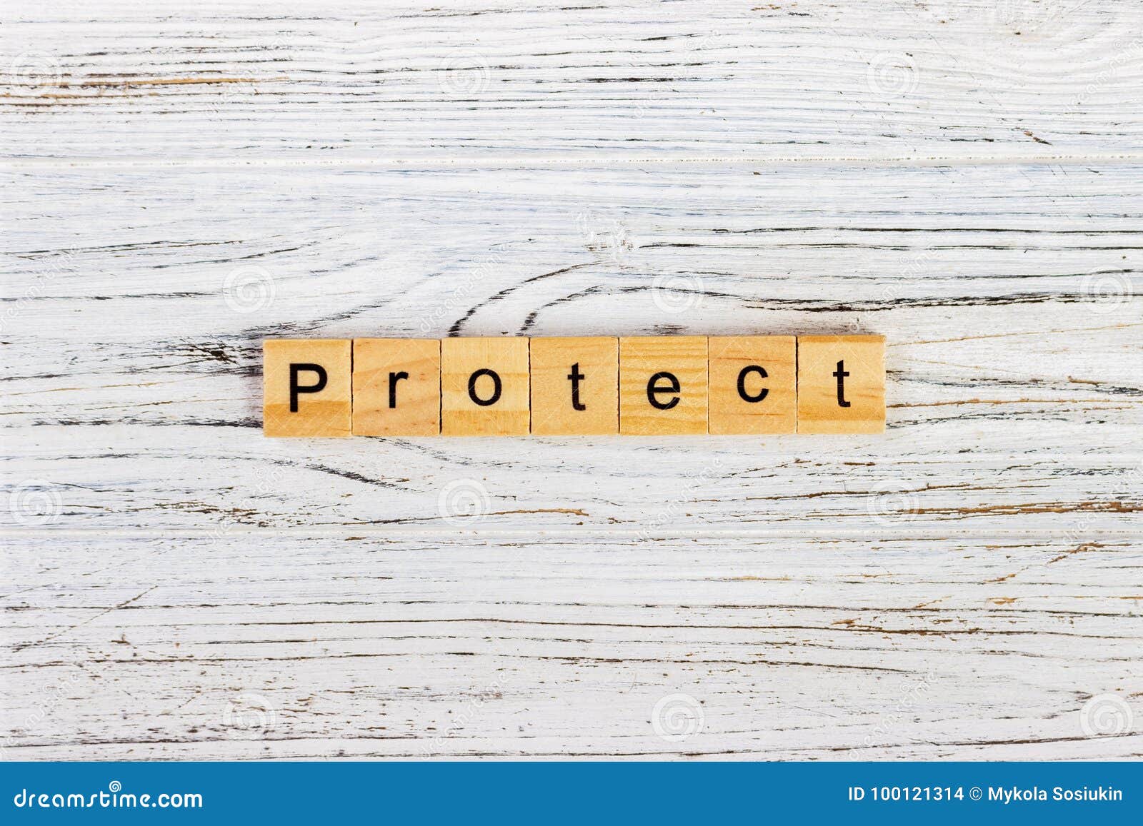 protect word on block concept. protect word made with wooden blocks on the table