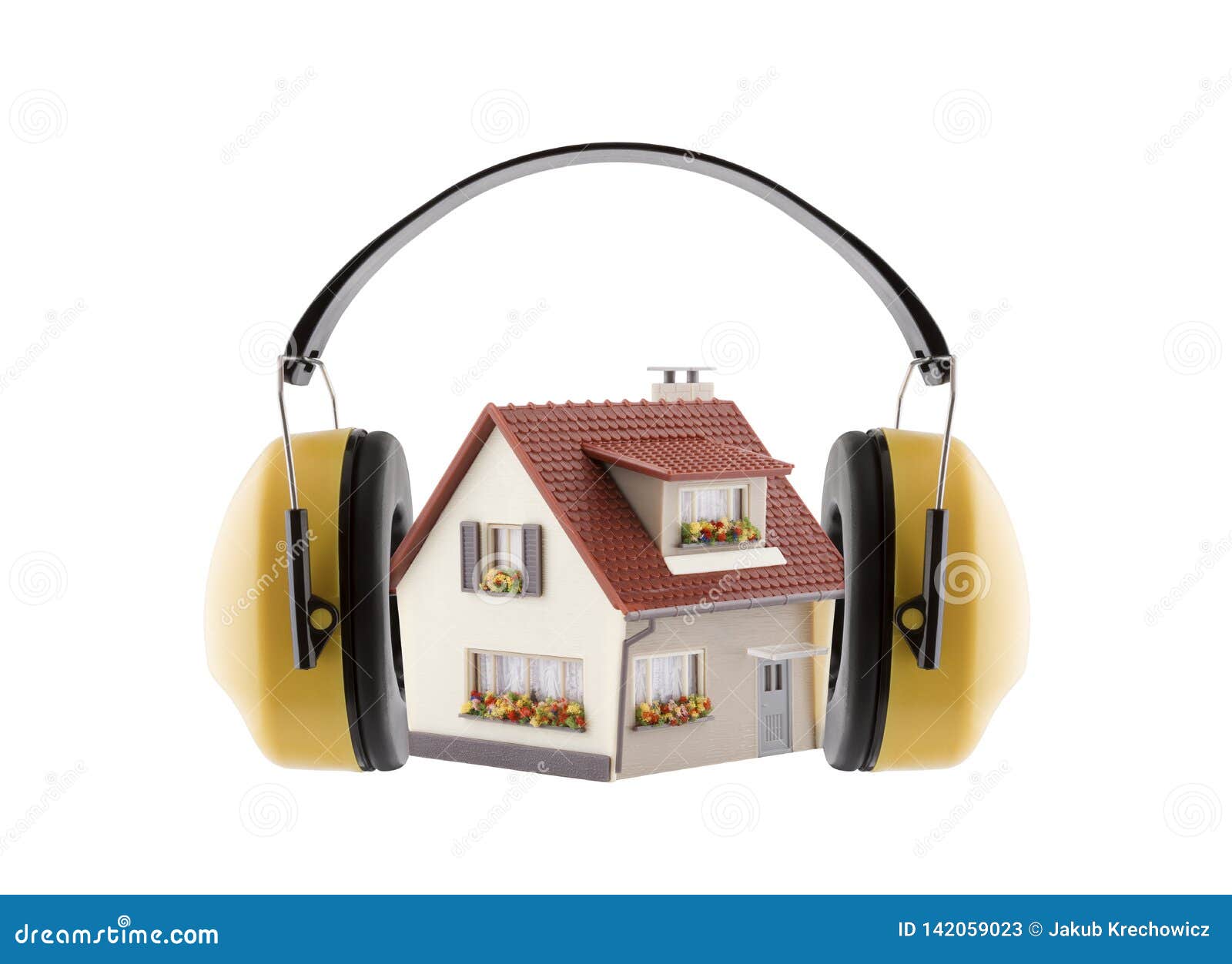 protection against noise. hearing protection yellow ear muffs with house miniature  on white background