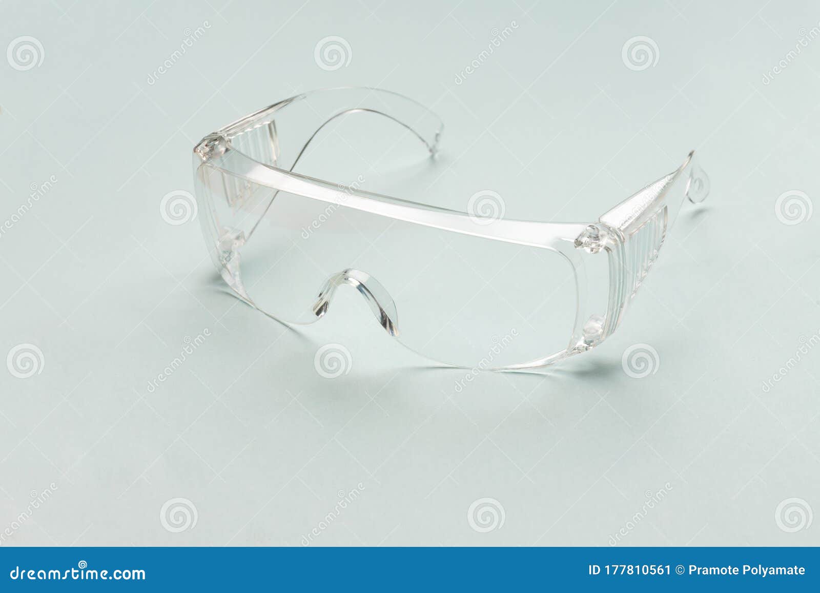 [Protection Medical] Protective Glasses Isolated on a Light Blue