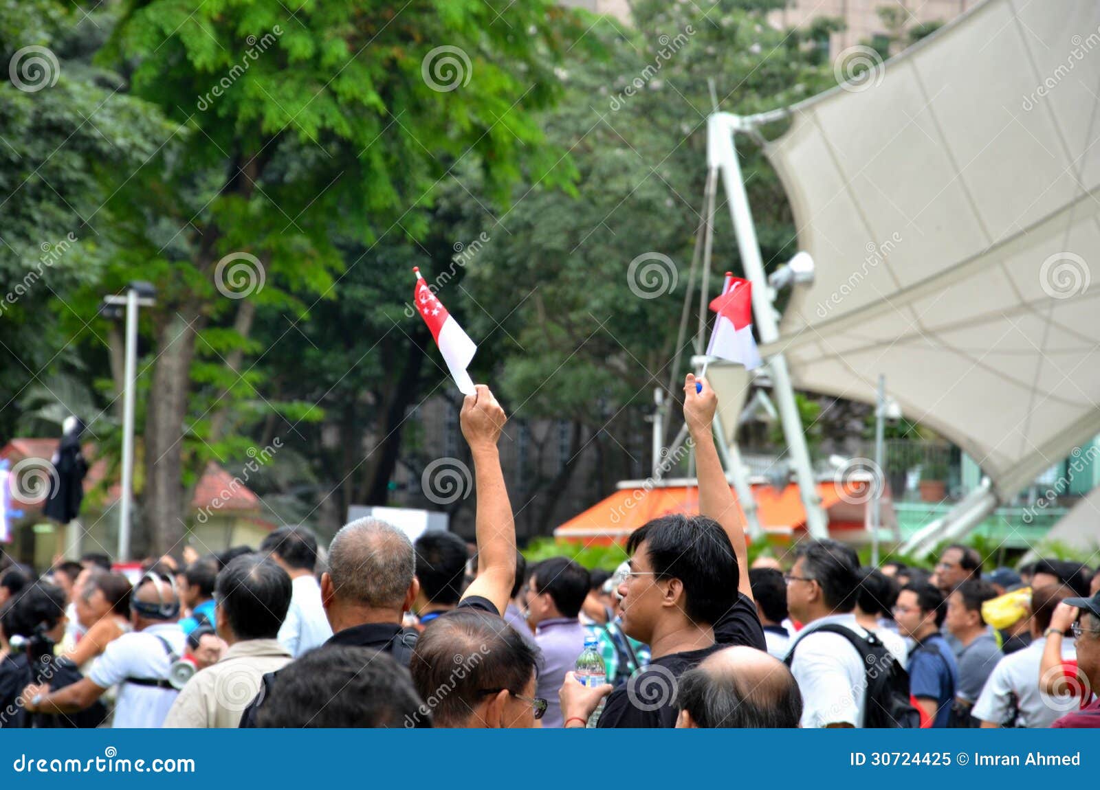 Protesters Wave Flags at May Day Rally Singapore Editorial Image