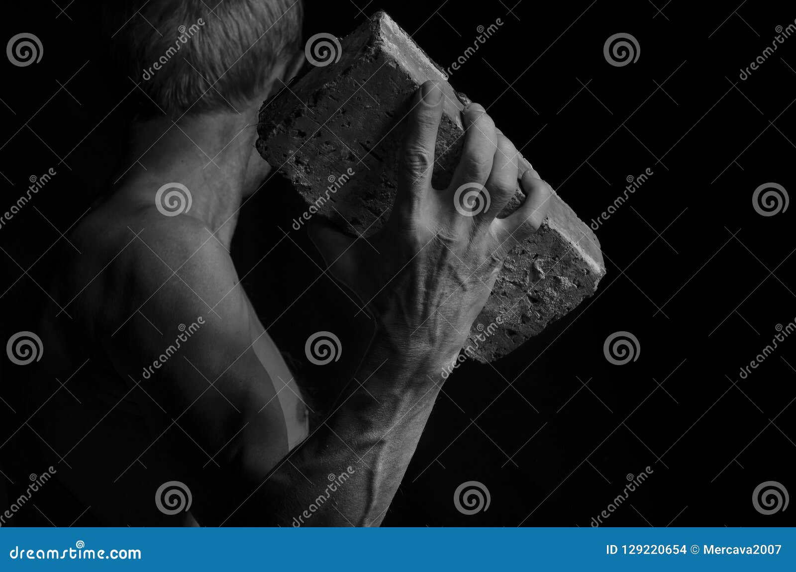 Protesting Man Throws a Brick. Stock Photo Image of protest, throw