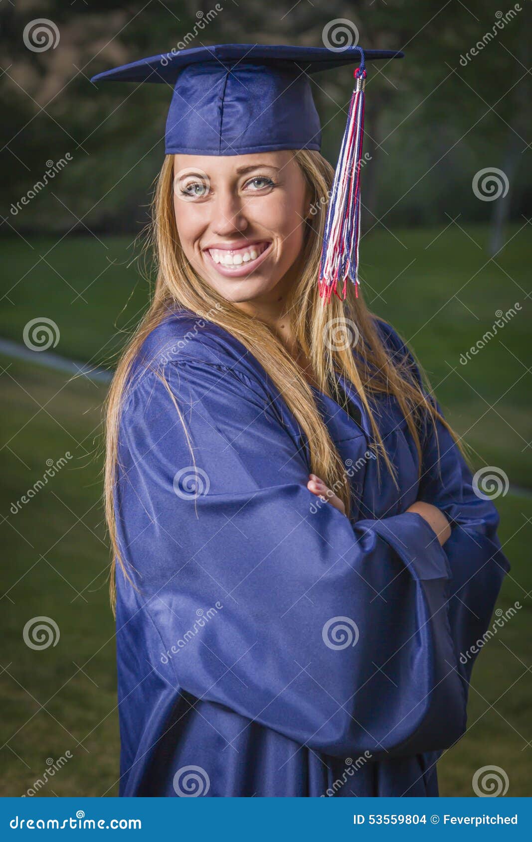Proud Female Graduate Wearing Cap and Gown Outdoors Stock Photo - Image of  relaxing, college: 53559804