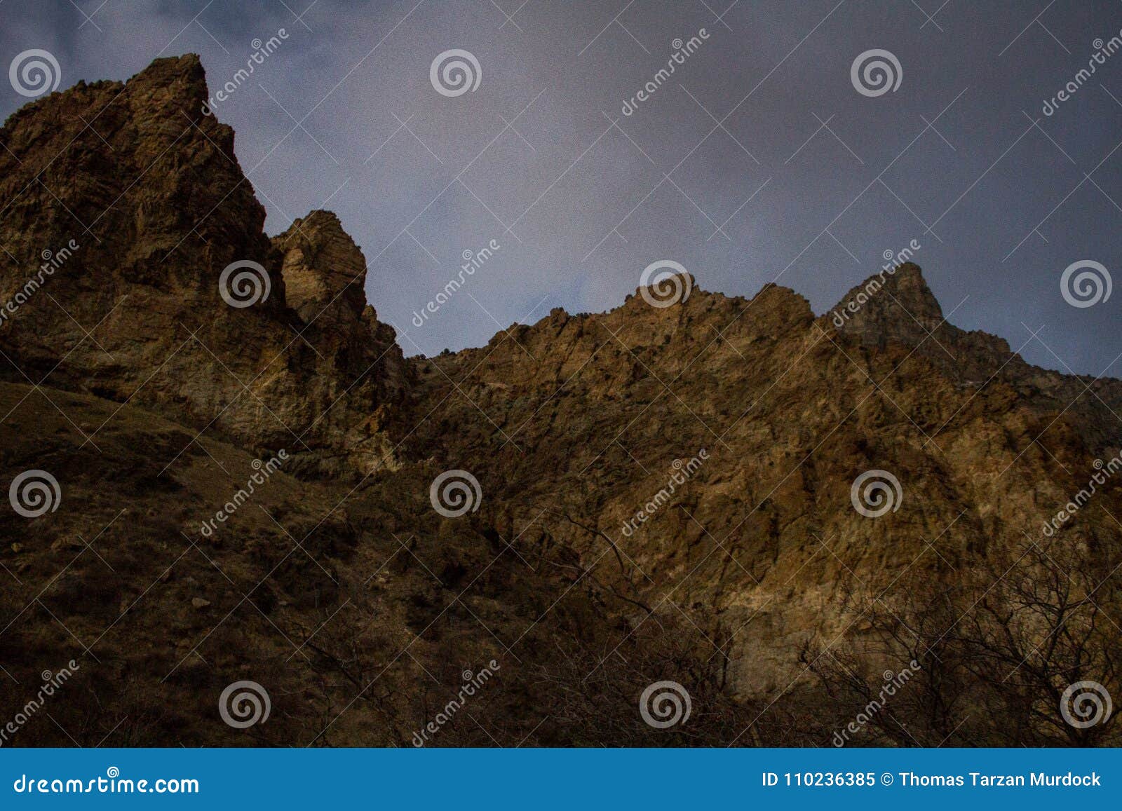 mountain peaks up rock canyon on the wasatch mountain range from crag to snow whisped summits