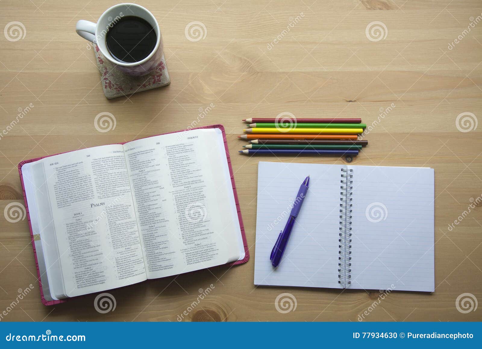 Pen, bible, and coffee mug on a table — Photo — Lightstock