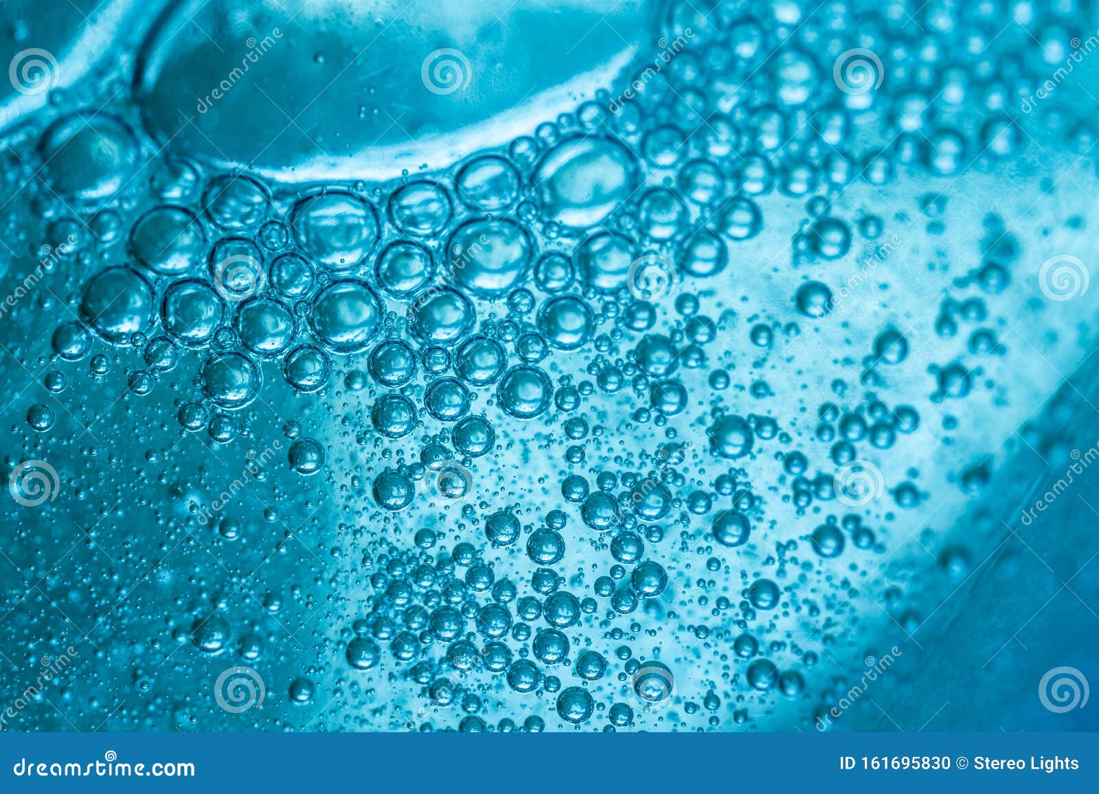 psychedelic blueand yellow oil and water abstract background. abstract colorful background. foam of soap with bubbles macro shot.