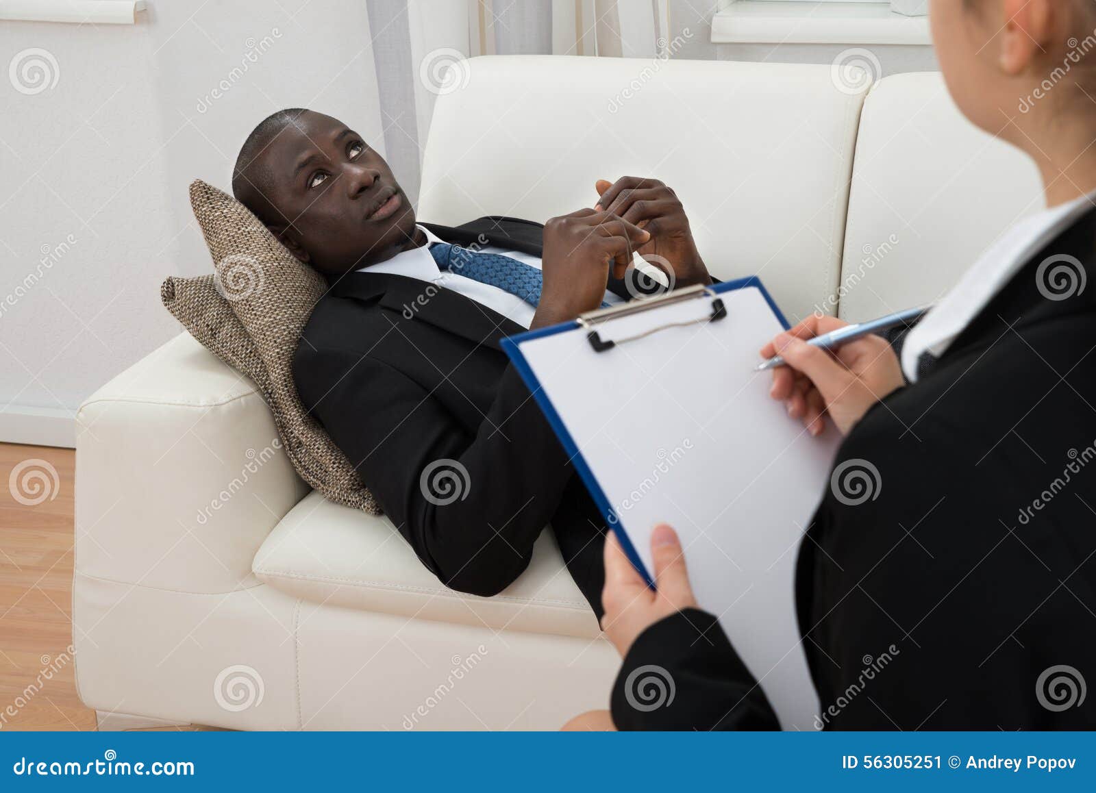 Psychiatrist Making Notes In Front Of Patient Stock Photo Image 56305251