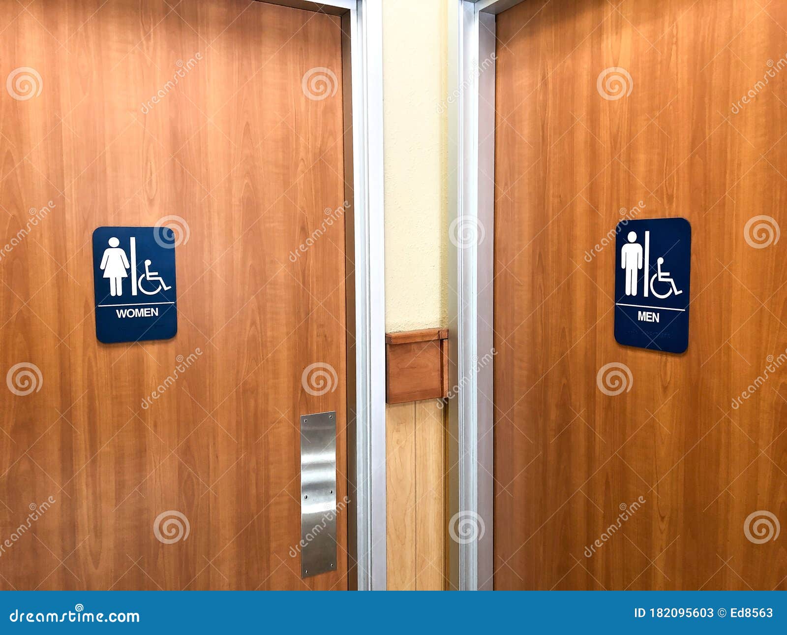 Public Restroom Doors for Male and Female with Blue Signs Stock Image