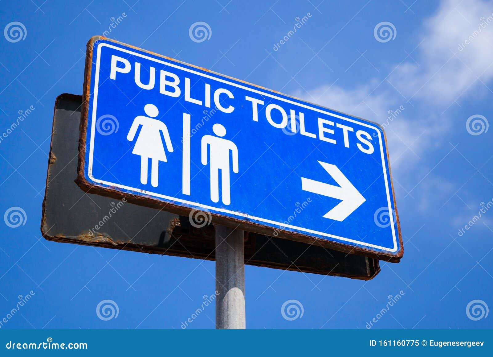 public-toilets-outdoor-sign-blue-board-under-cloudy-sky-161160775.jpg