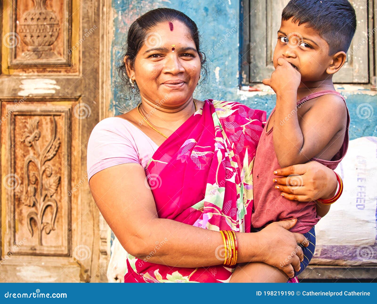 2 indian mother and dayghter standing pose Stock Photo - Alamy