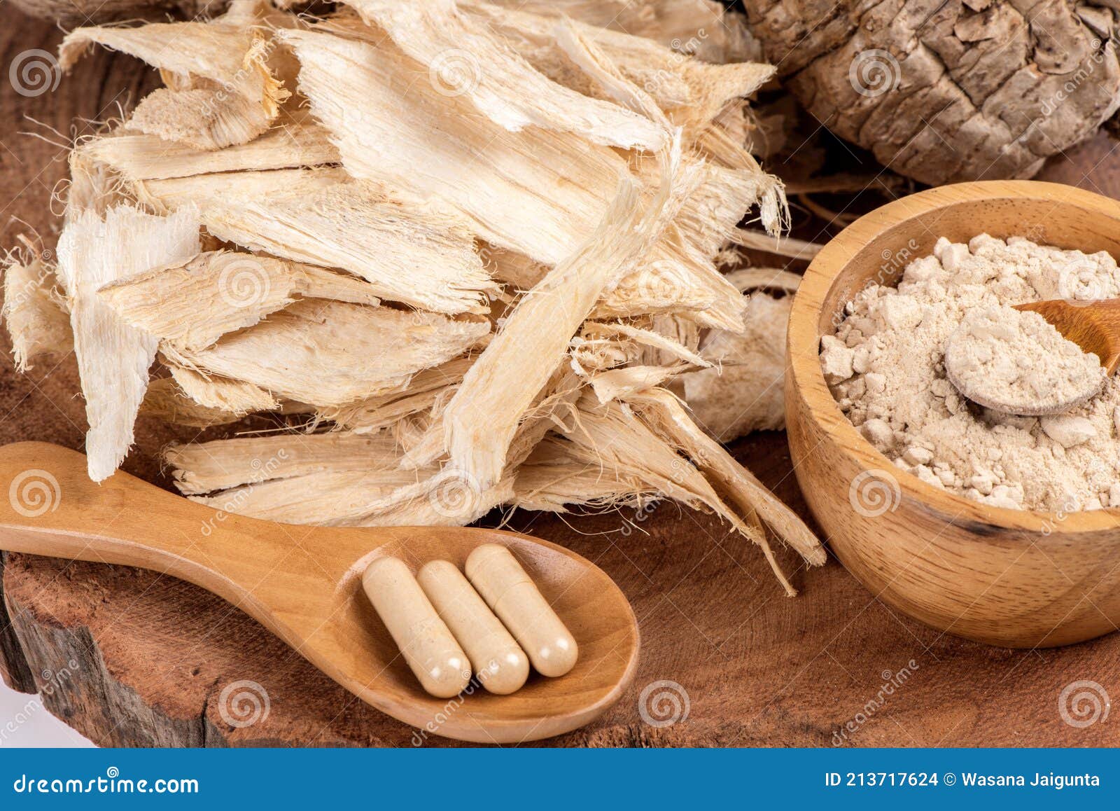 pueraria mirifica or white kwao krua fruit ,dried slices ,powder and powder in capslue  on background