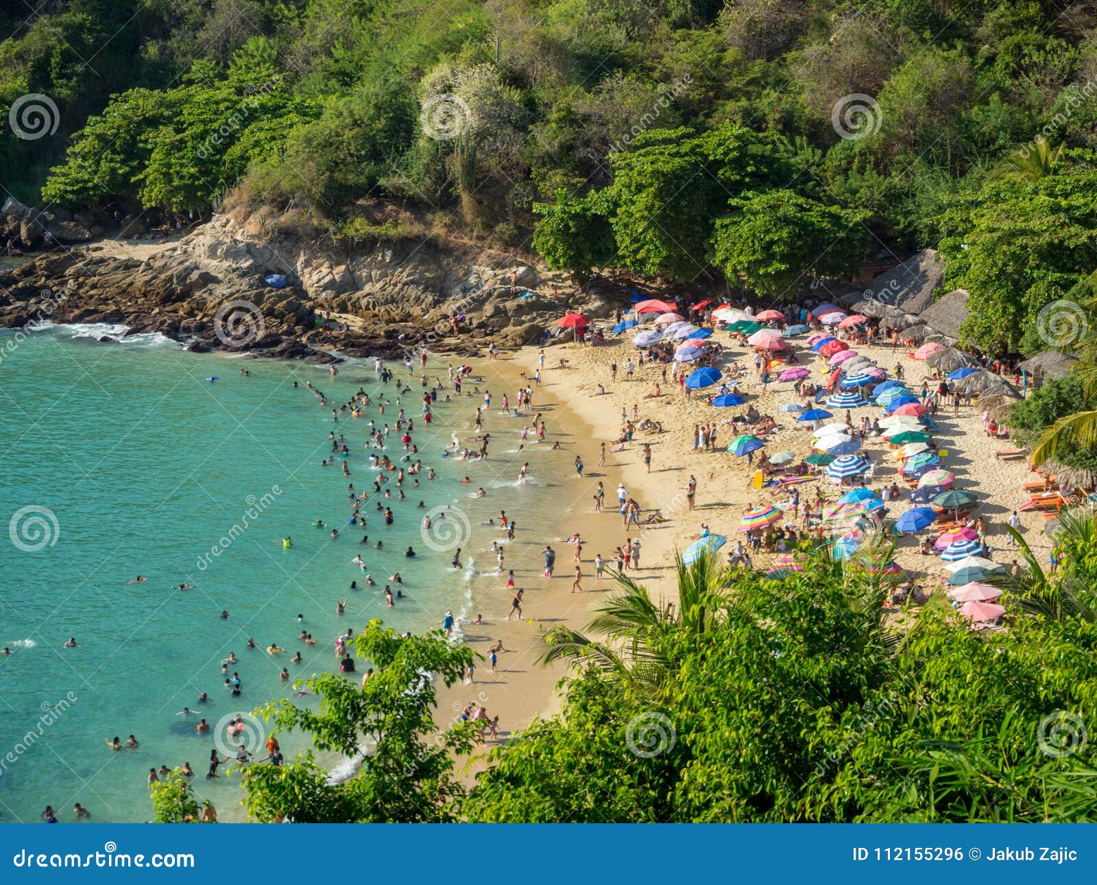 puerto escondido, oaxaca, mexico, south america: [playa carrizalillo, crowdwed natural beach, tourist destination]