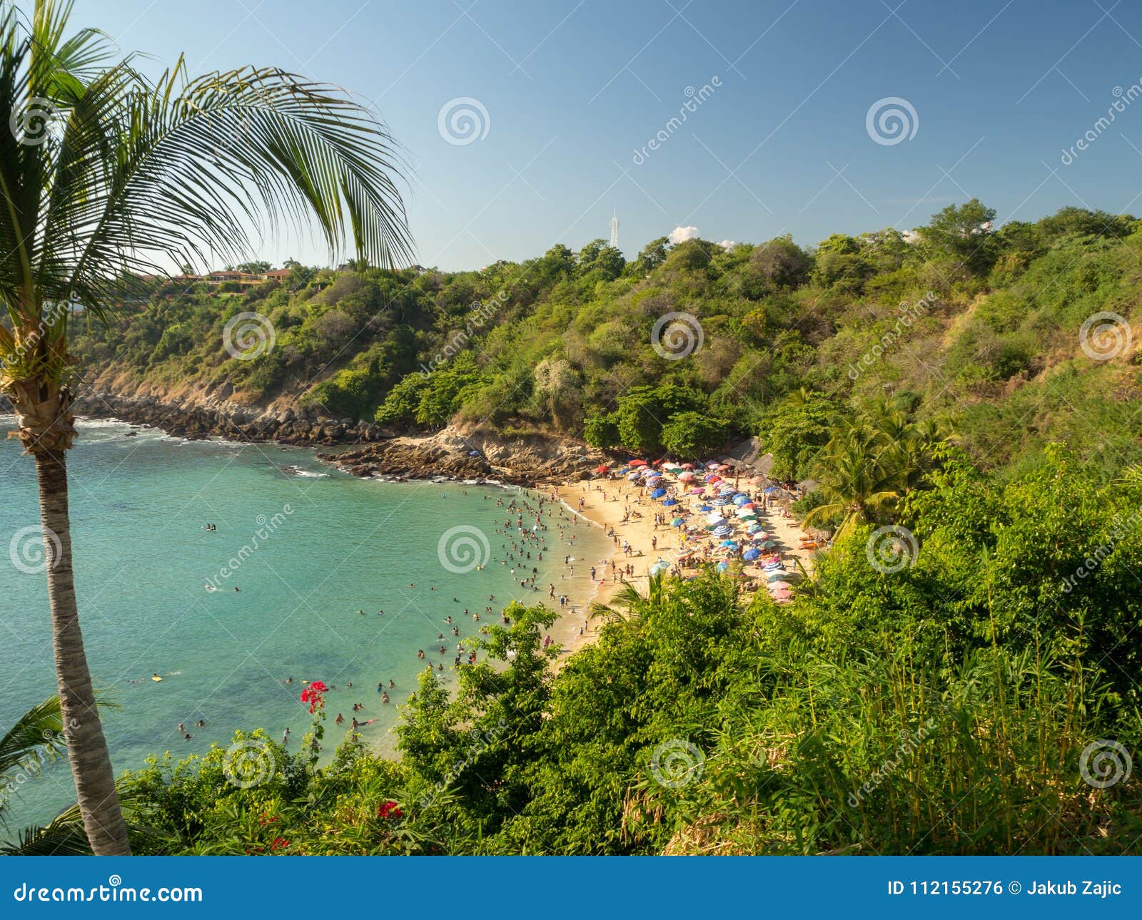 puerto escondido, oaxaca, mexico, south america: [playa carrizalillo, crowdwed natural beach, tourist destination]