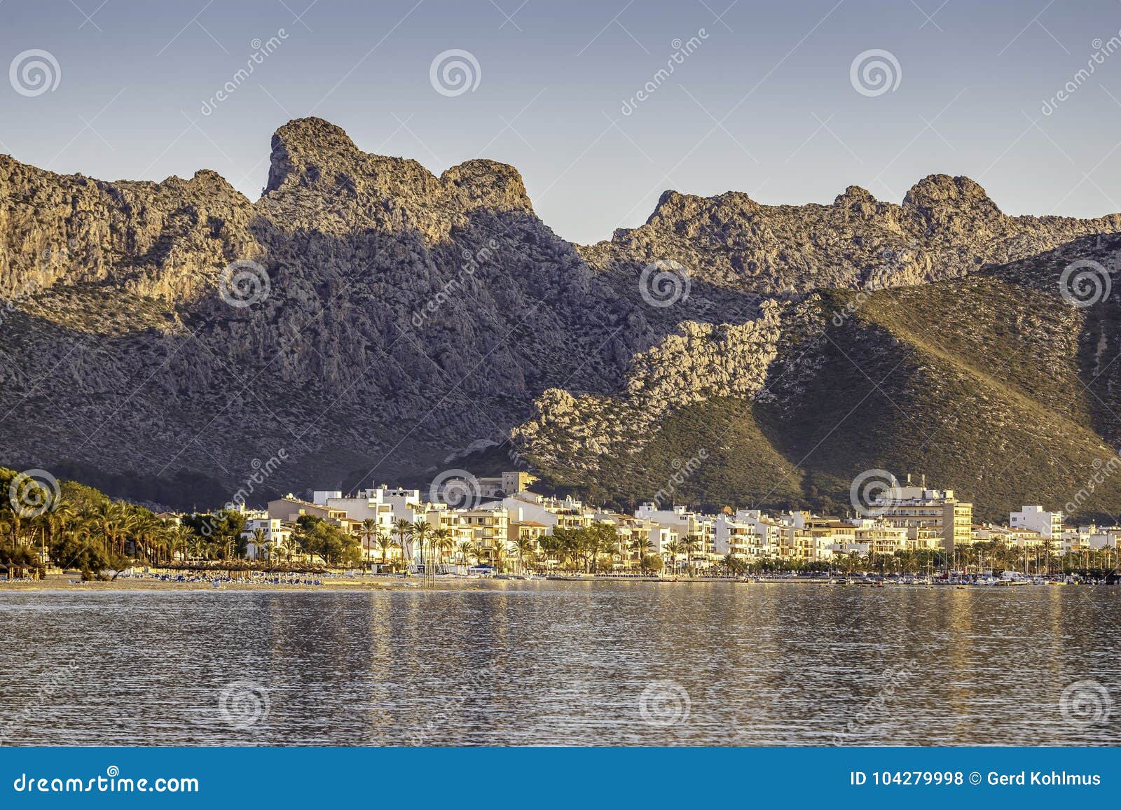 puerto pollensa lit up by morning sun