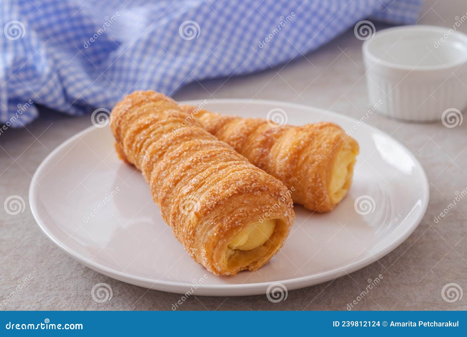 Puff Pastry Cream Horn with Vanilla Cream on Plate Stock Photo Image