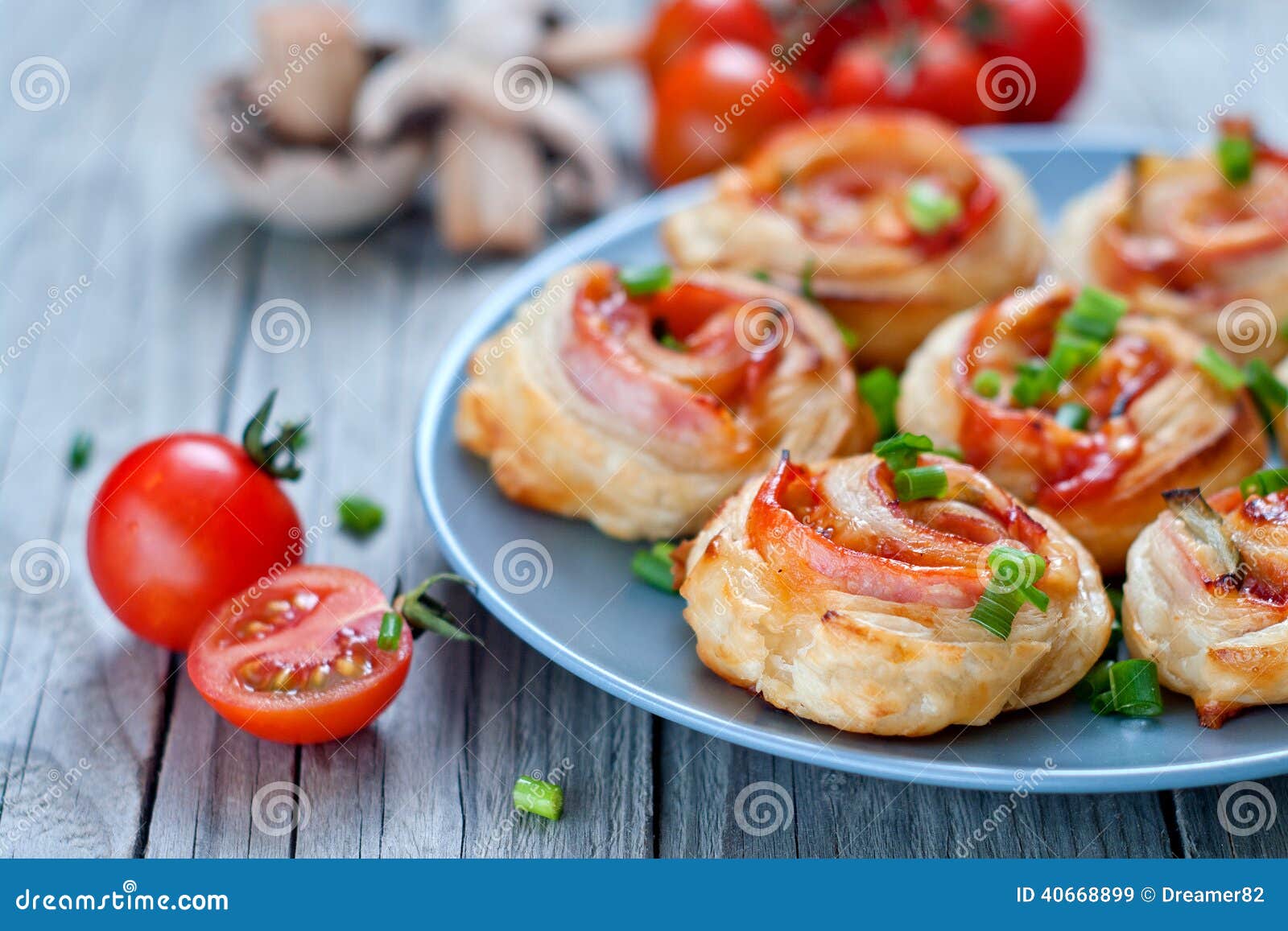 puff pastry rolls with ham and chese. baked snacks