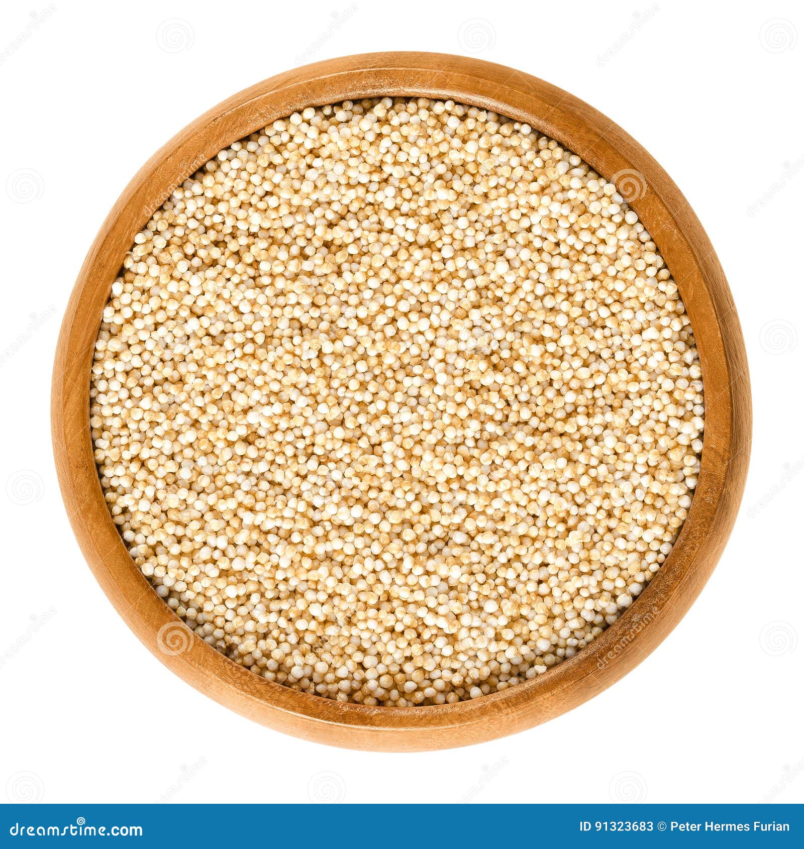 puffed amaranth in wooden bowl over white