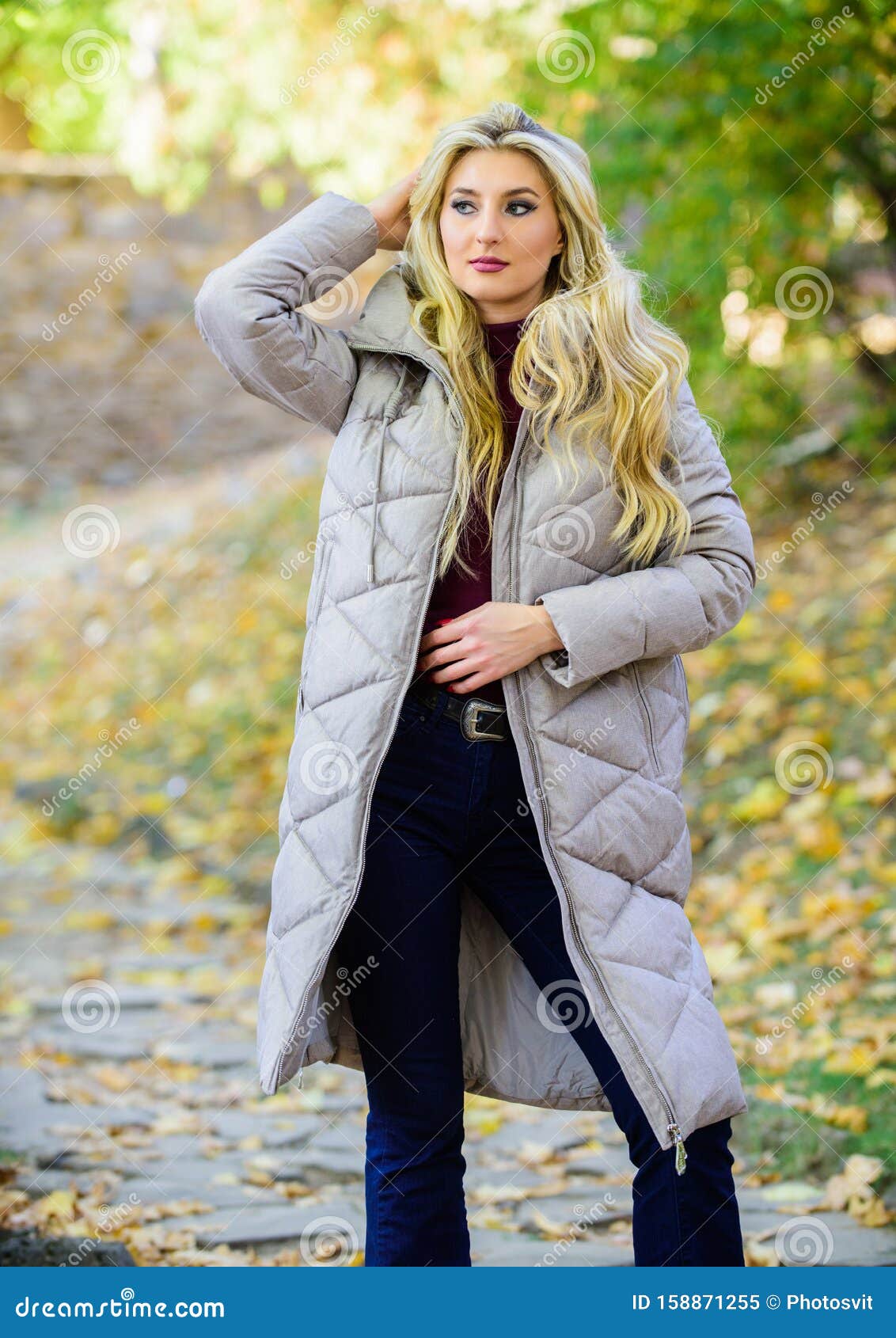 Puffer Fashion Trend Concept. Girl Fashionable Blonde Walk in Autumn ...