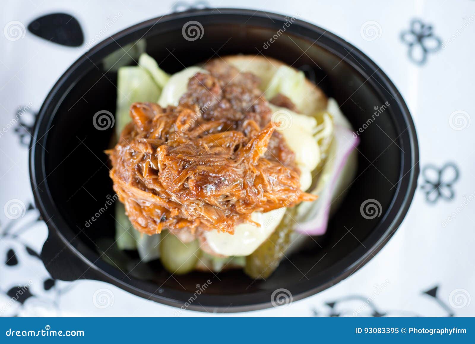 Pulled Meat with Melted Cheese, Pickles, and Bread in Bowl Stock Image