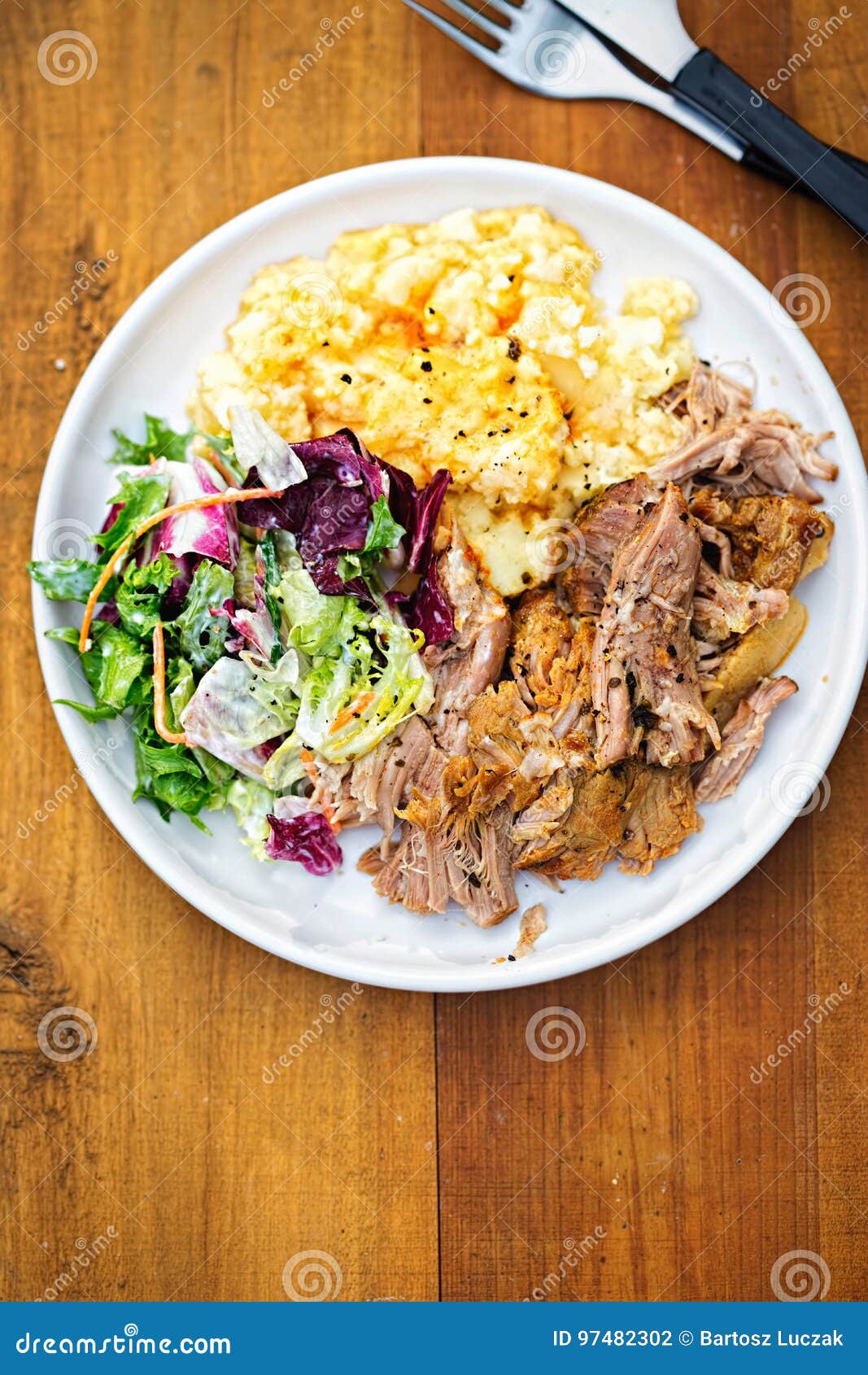 Pulled Pork With Mashed Potatoes And Mixed Leaves Salad On ...