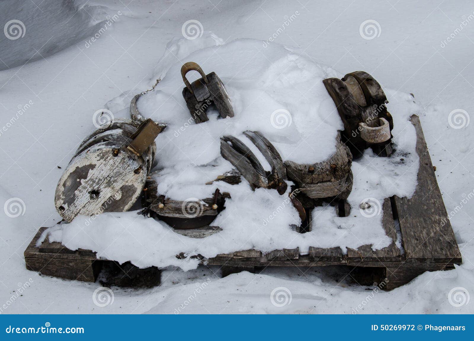 pulley blocks covered by snow
