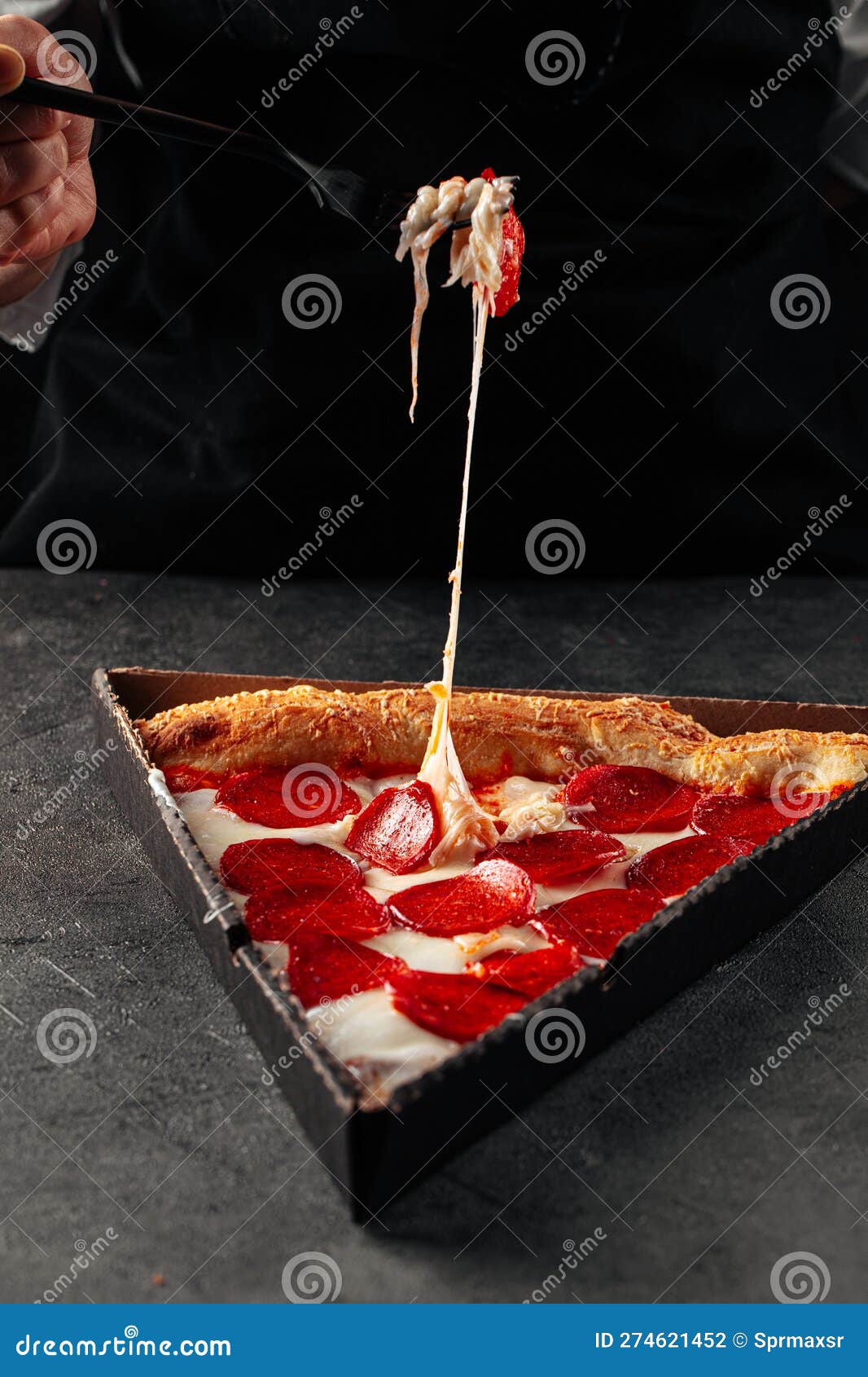 Pulling Cheese from Slice of Pepperoni Pizza Stock Photo Image of