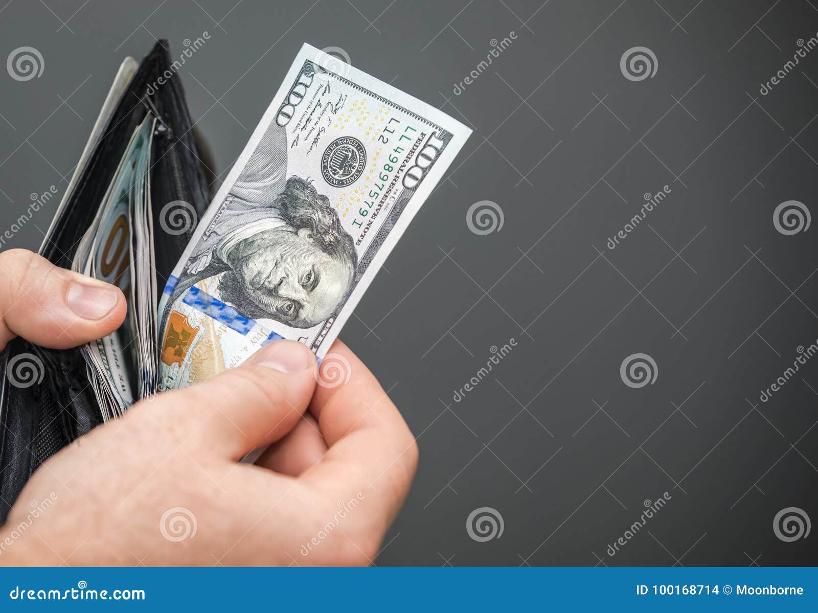 Pulling Money Out of a Wallet Stock Photo Image of american, economy 100168714
