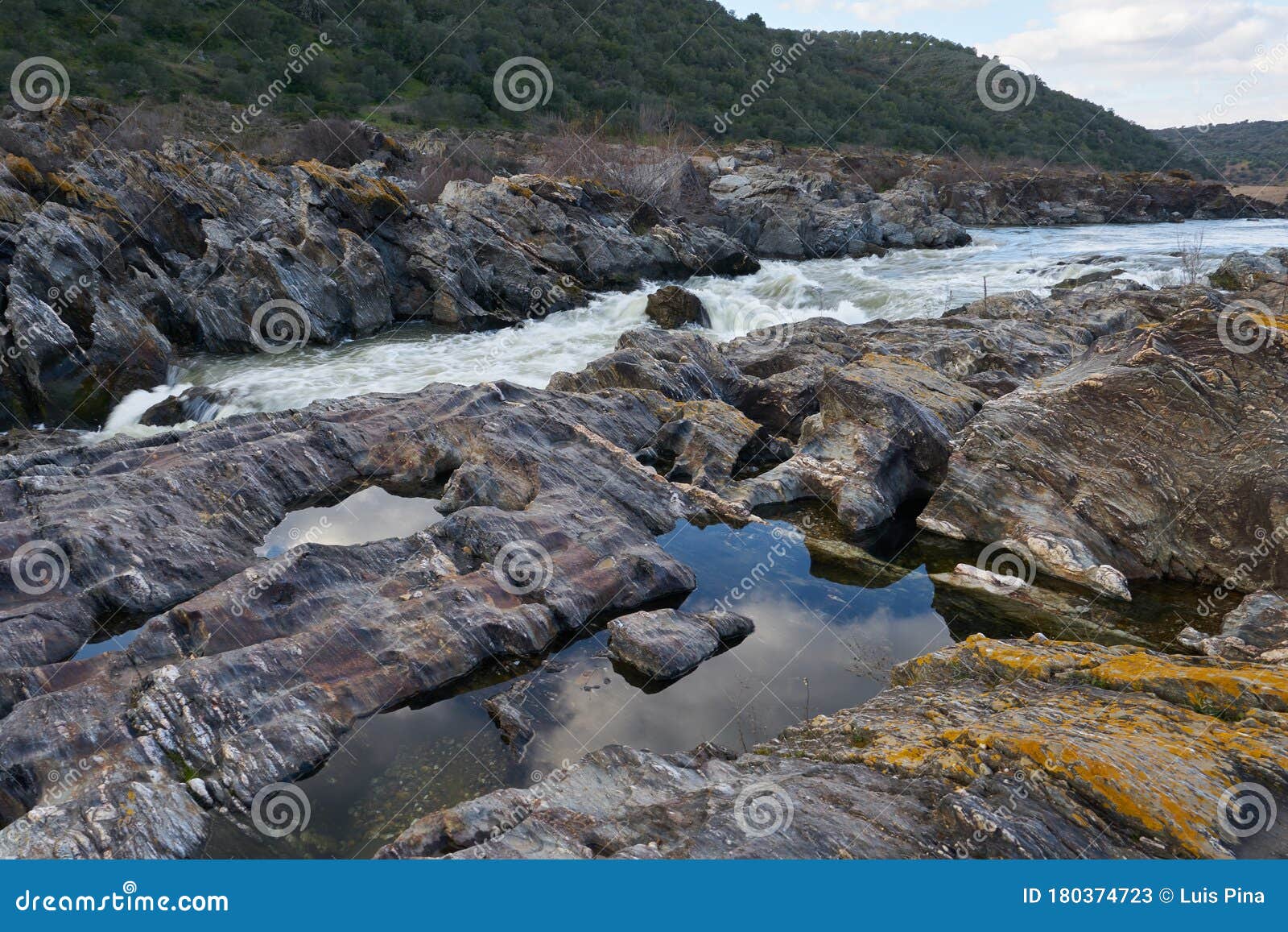 pulo do lobo waterfall with river guadiana and rock details in mertola alentejo, portugal