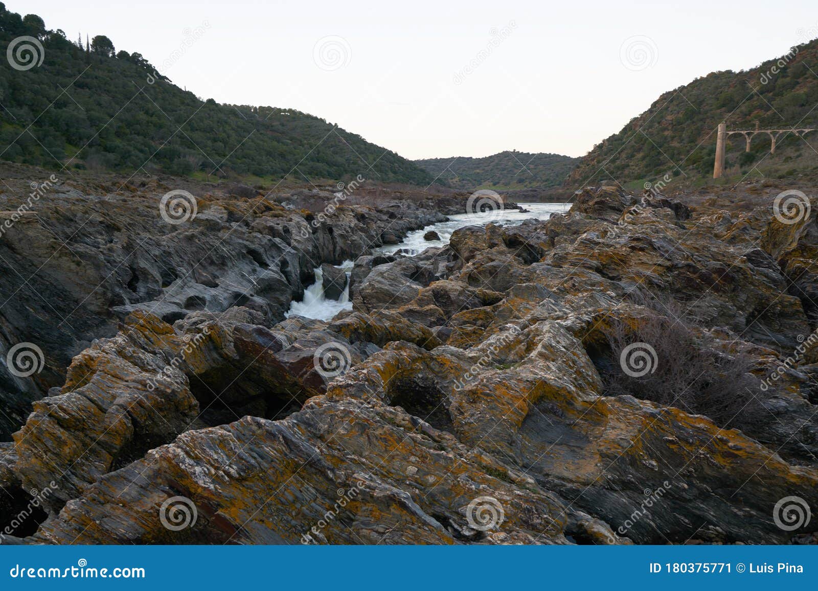 pulo do lobo waterfall with river guadiana and rock details in mertola alentejo, portugal