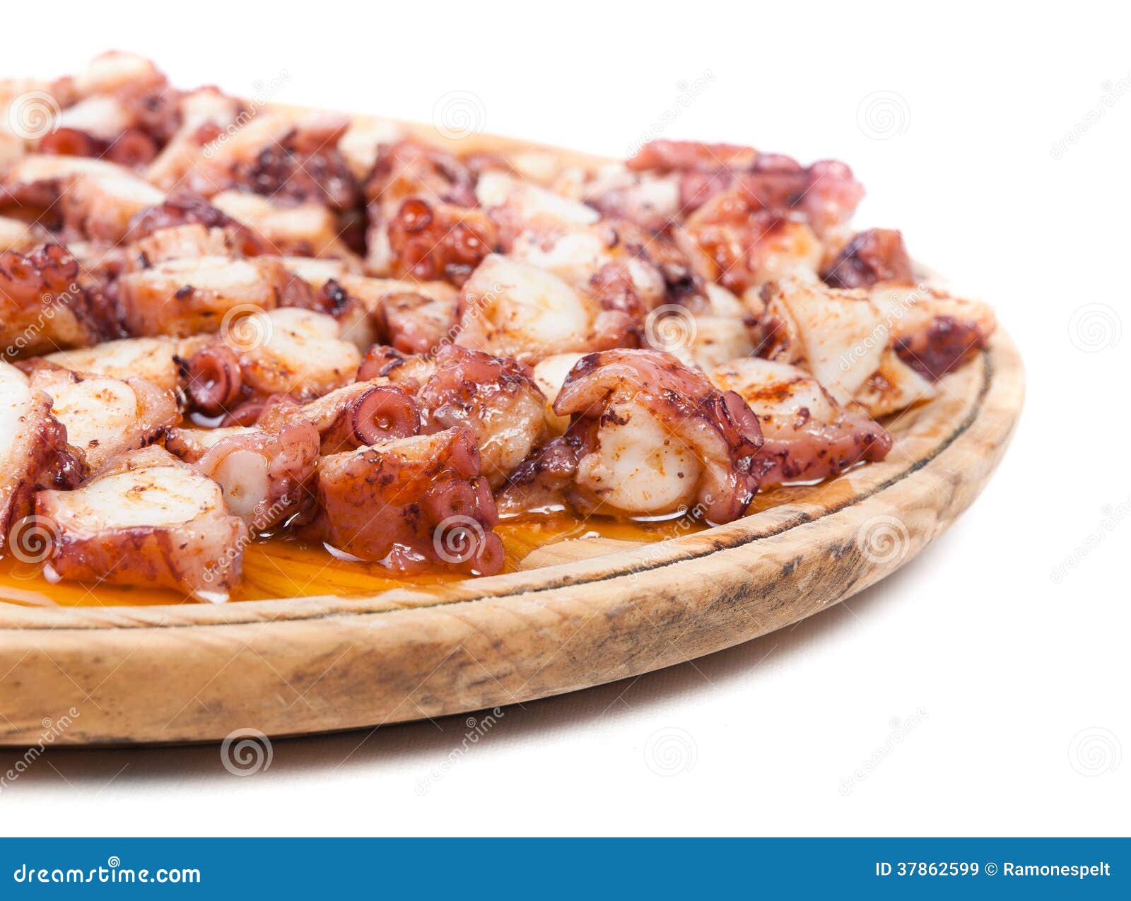 pulpo a feira in a wooden plate