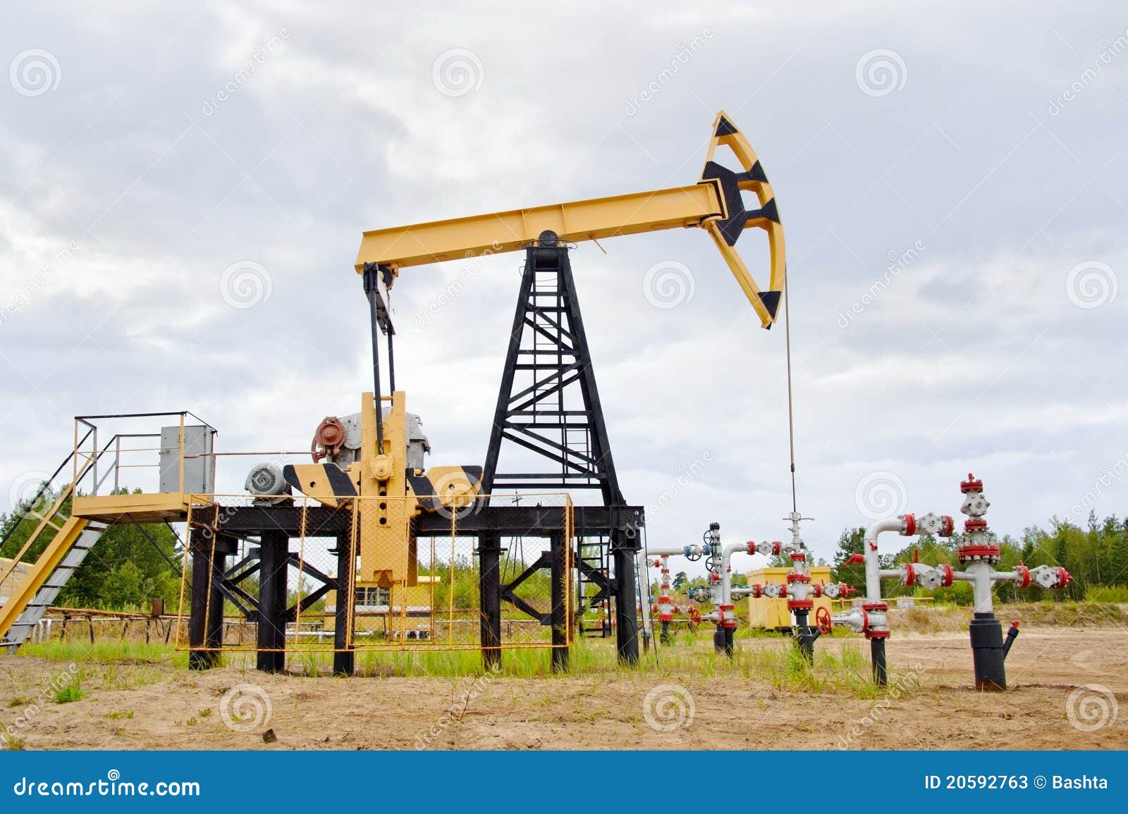 Pump jack and oil well. stock image. Image of generation 20592763