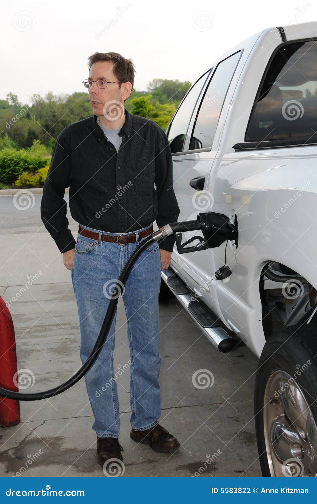 Pumping Gas stock photo. Image of fuel, people, casual 5583822