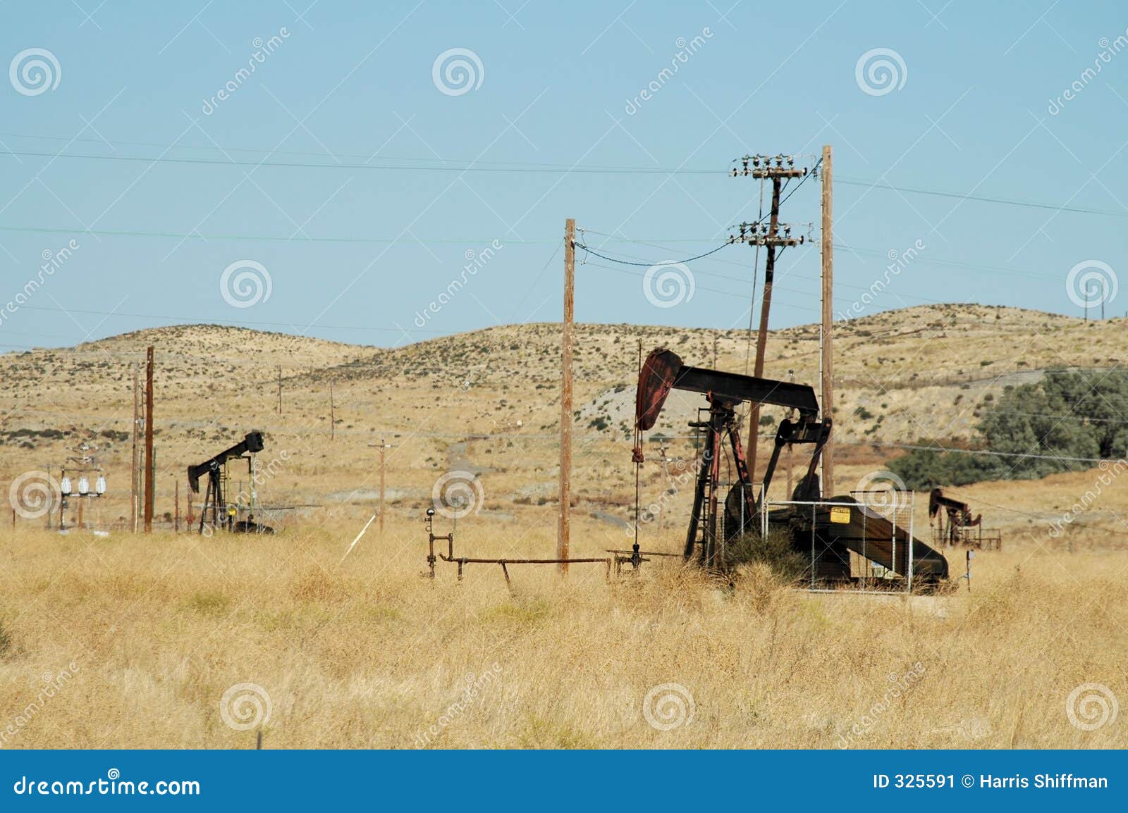 Pumping oil stock image. Image of pump, hills, derrick 325591