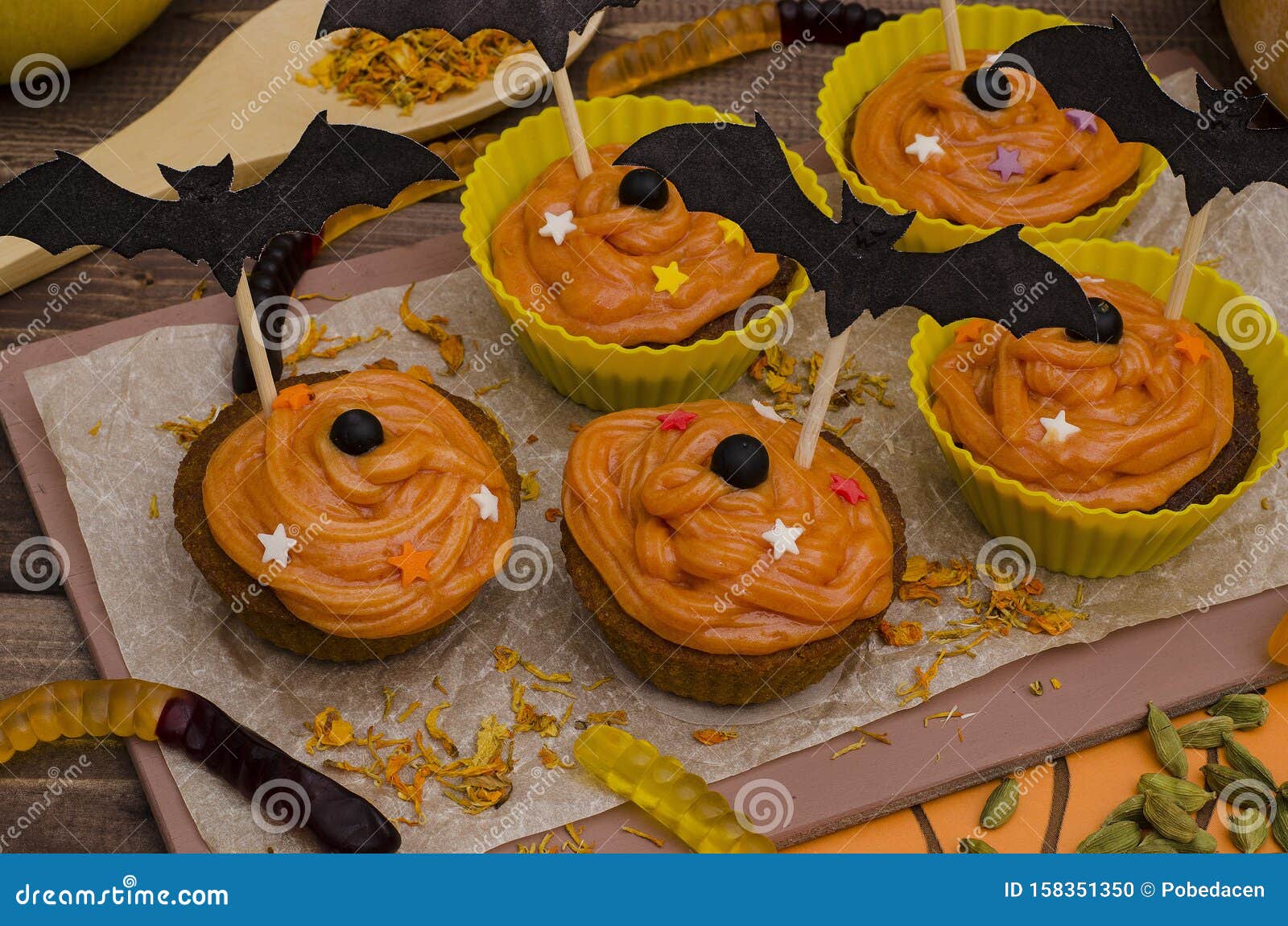 Pumpkin Cupcakes for Halloween. Ideas for Baking, Sweets Stock Photo