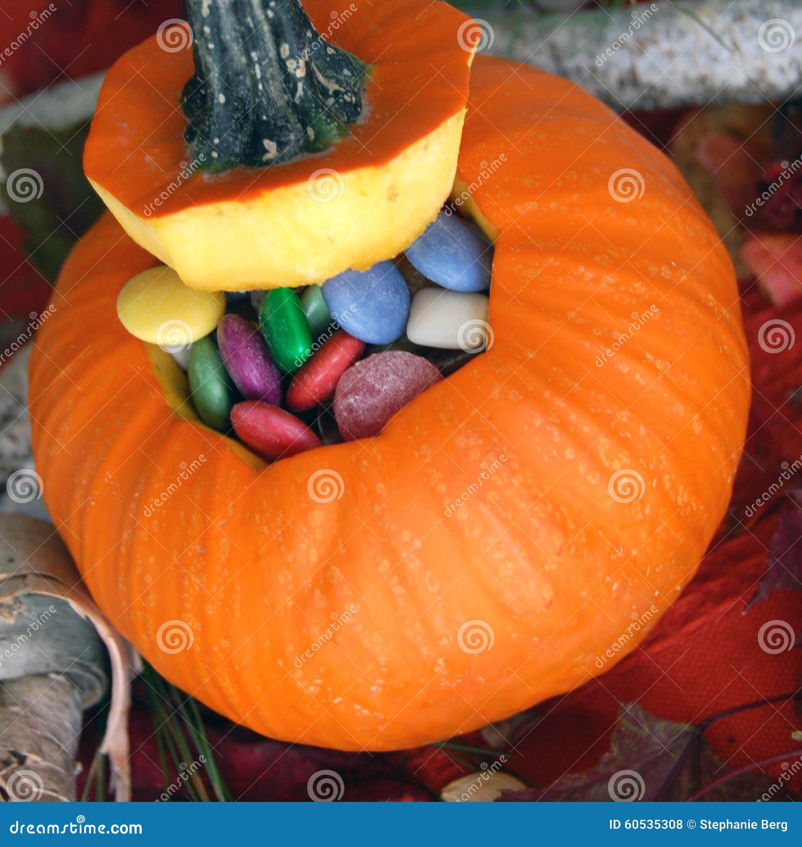 Pumpkin Filled with Candy stock photo. Image of halloween 60535308
