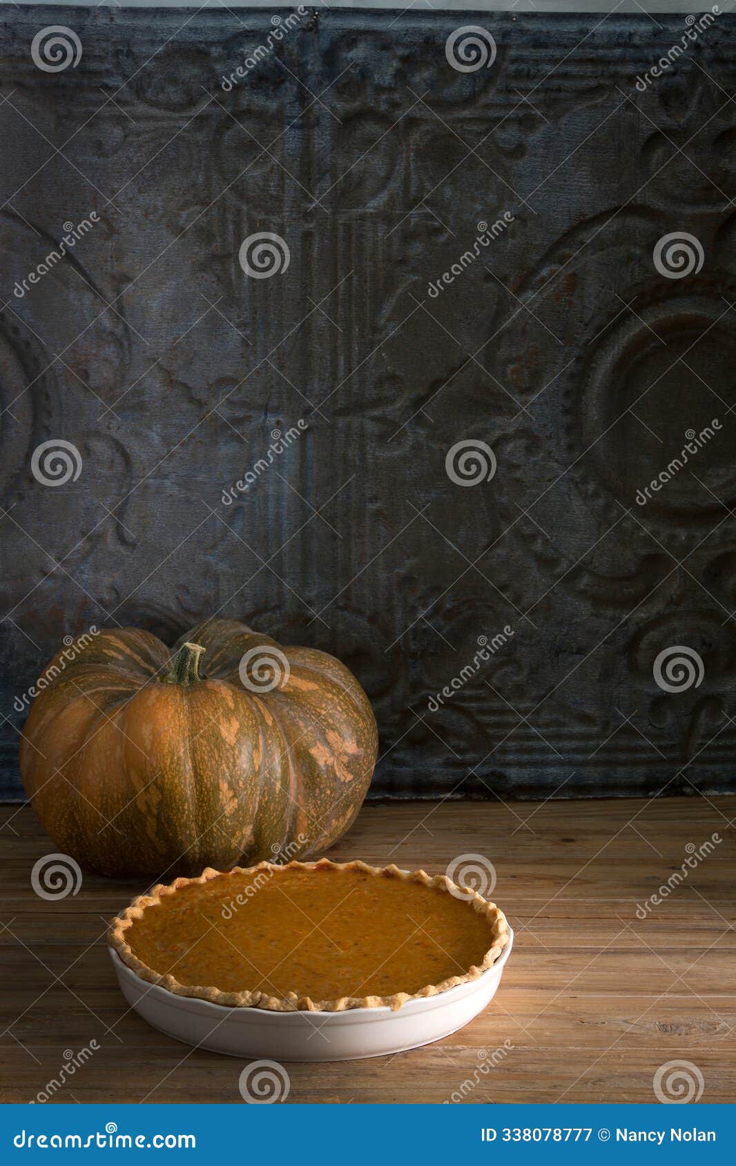 pumpkin pie and pumpkin display with rustic farmhouse charm