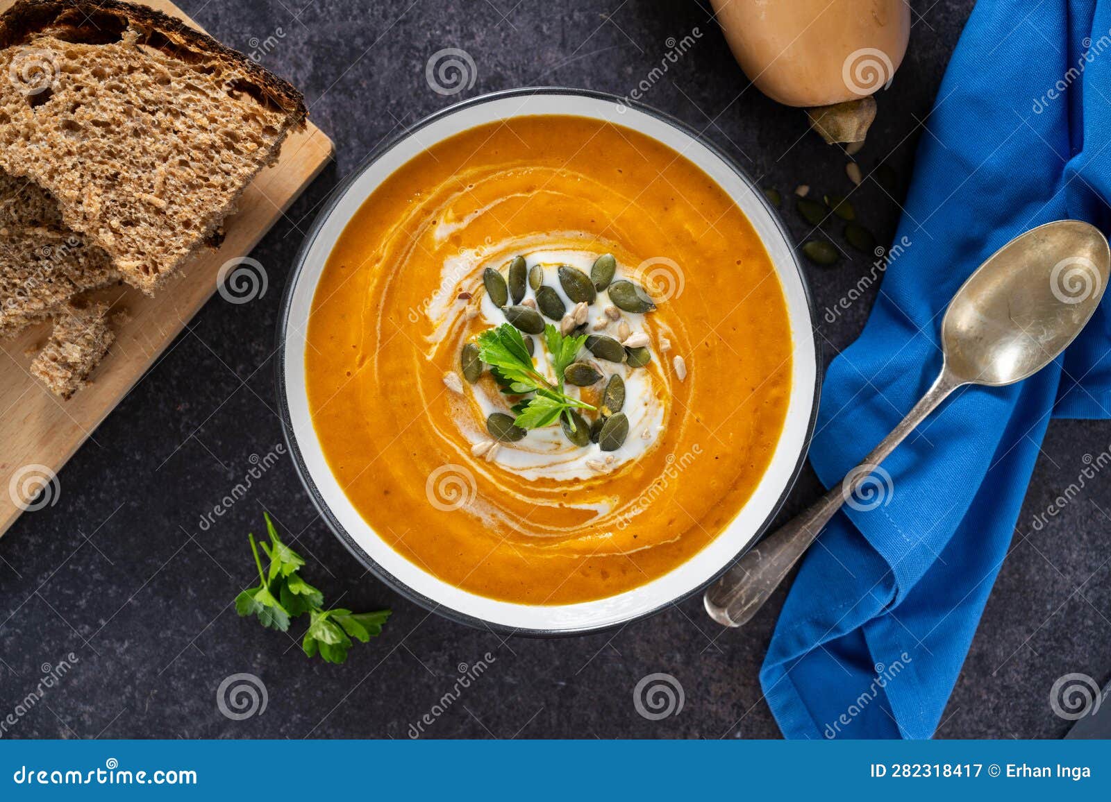 Pumpkin Vegetable Soup and Sourdough Bread. Top View. Stock Image