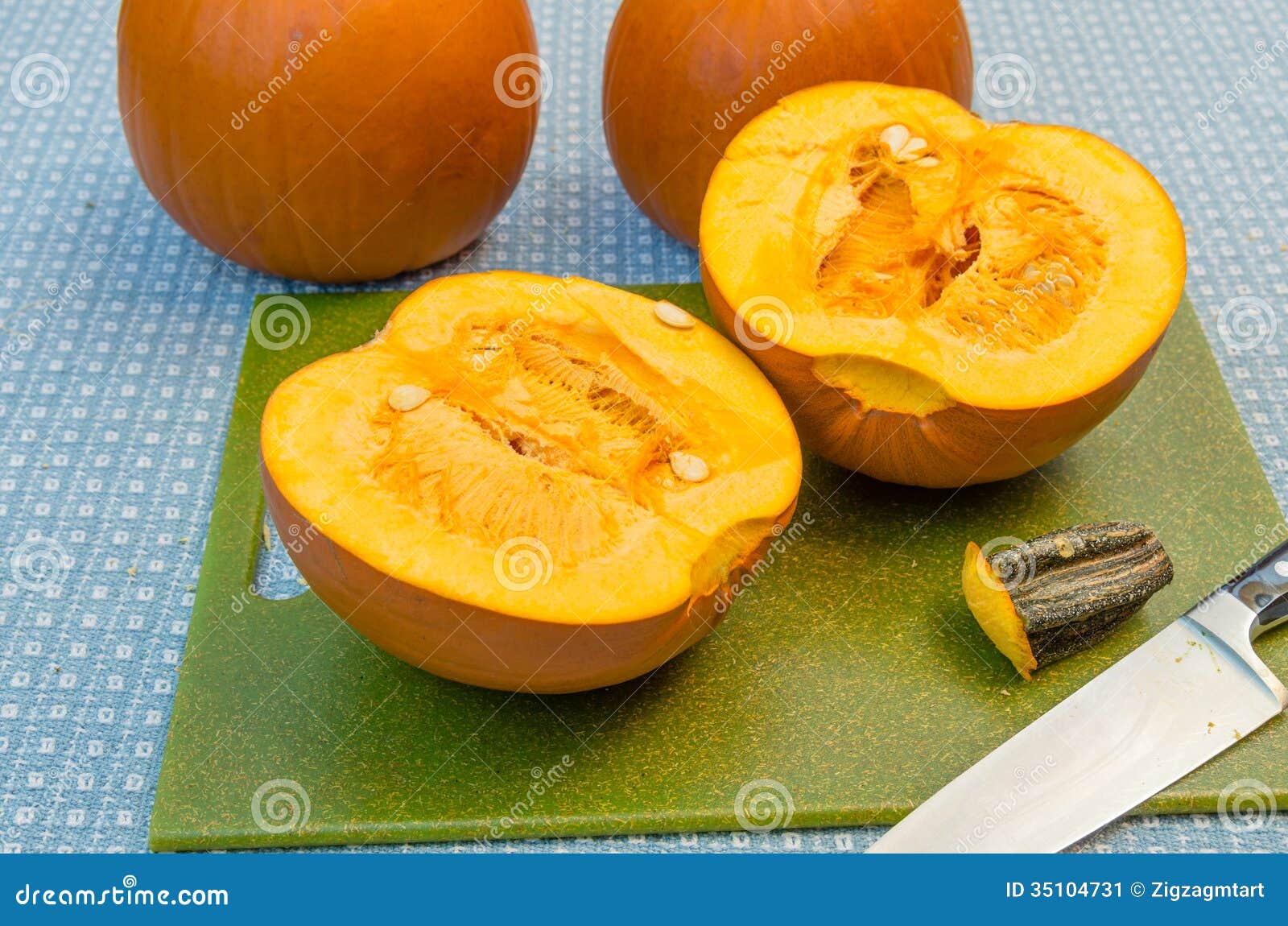 Pumpkins Cut in Half To Extract the Seeds Stock Image Image of
