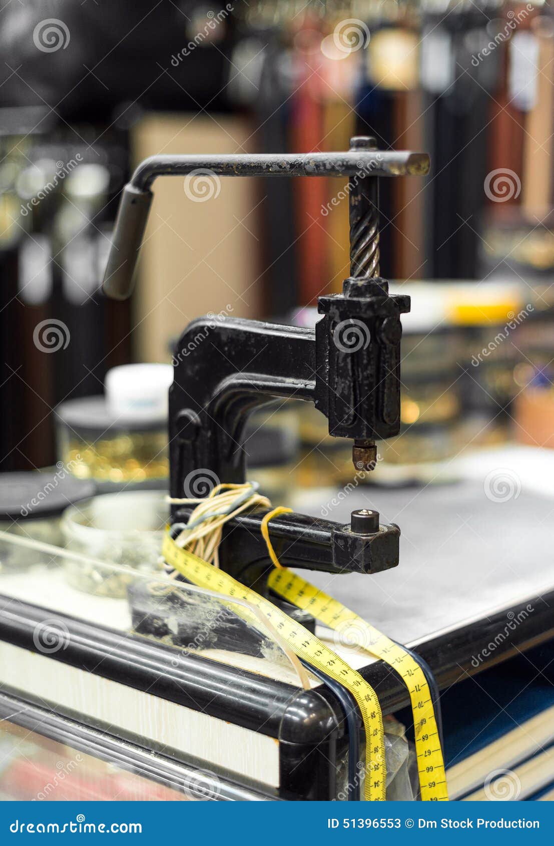 Puncher for belts. stock image. Image of customer, paper 51396553