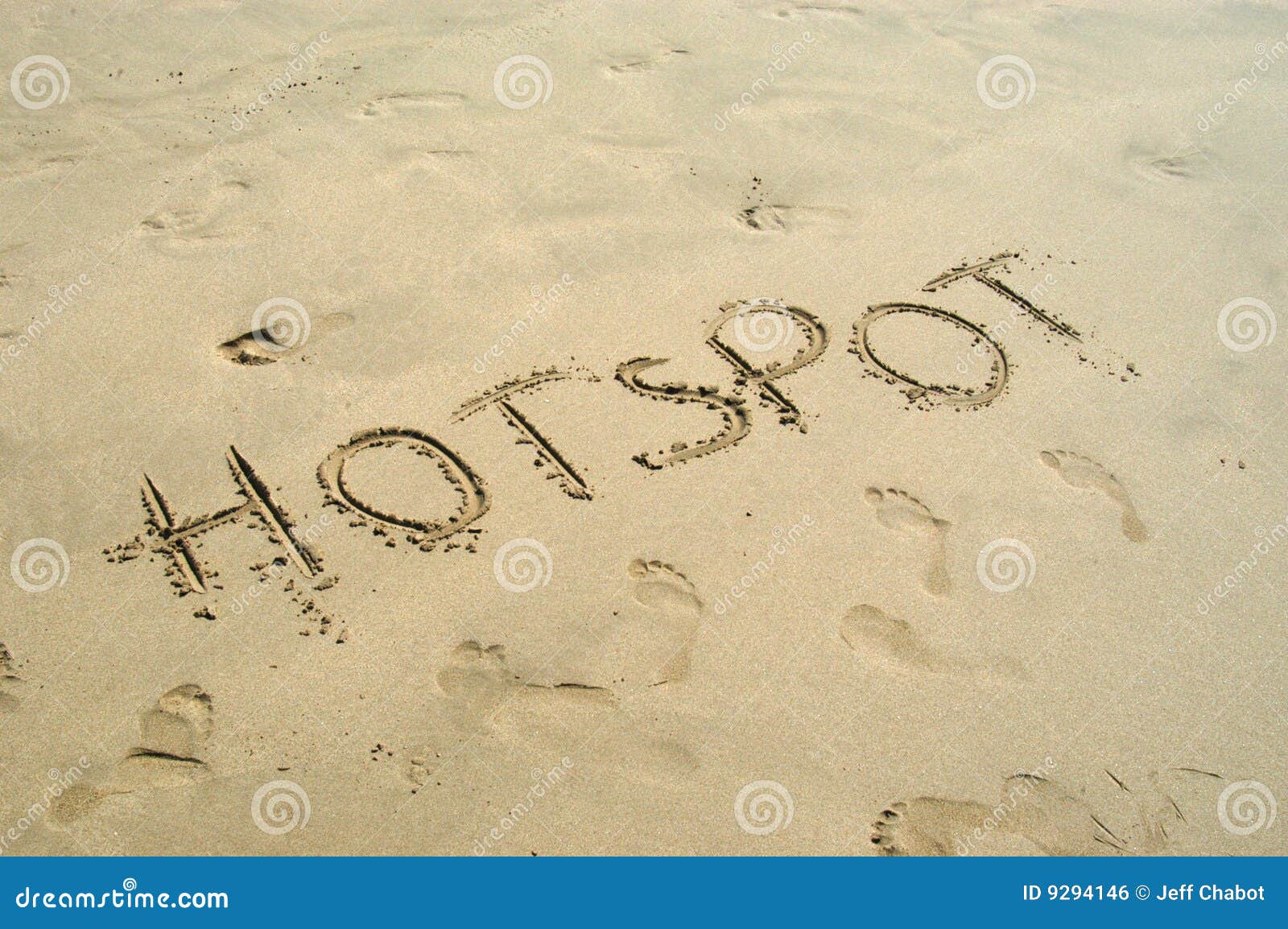 Punto Caldo Scritto in Sabbia Fotografia Stock Immagine di