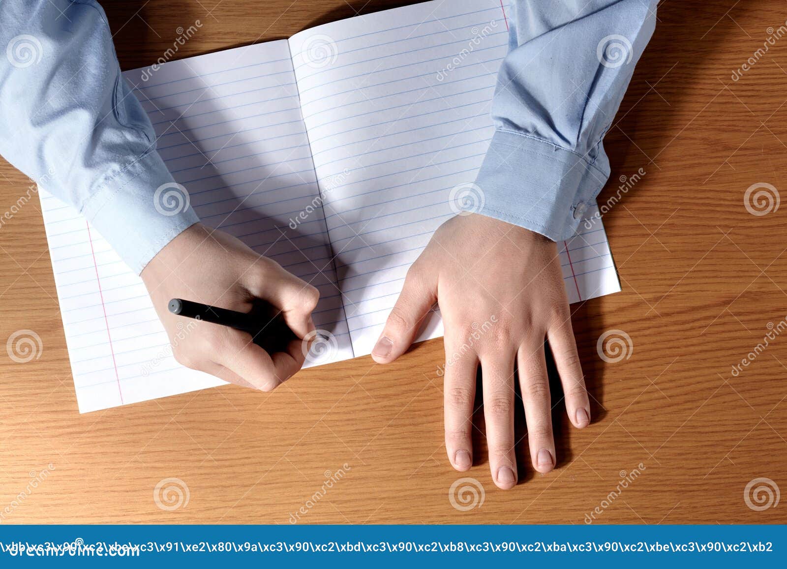 Pupil Boy at a Desk Writing in a Exercise Book. Stock Image - Image of ...