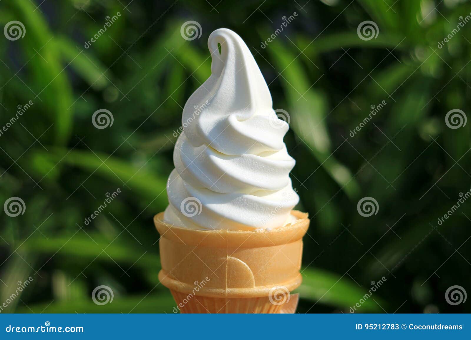 pure white vanilla soft serve ice cream cone