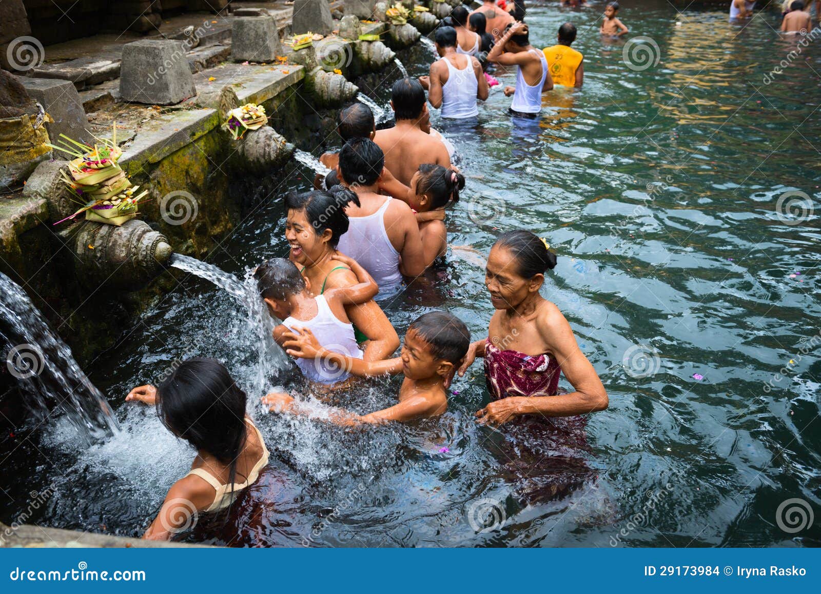 Purification In Sacred Holy Spring Water, Bali Editorial Stock Image