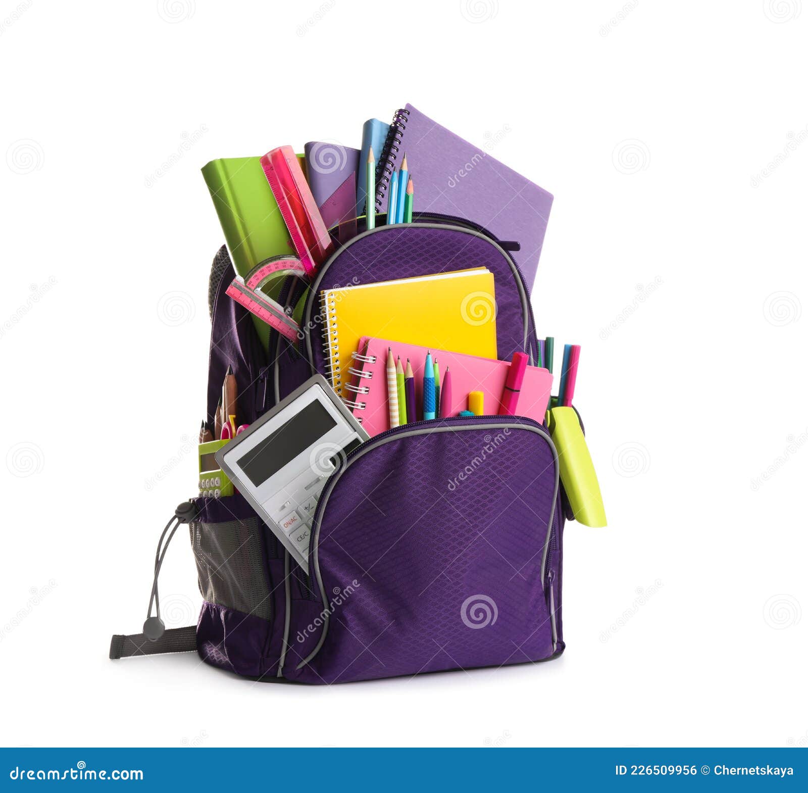 Purple Backpack with Different School Supplies Isolated on White Stock