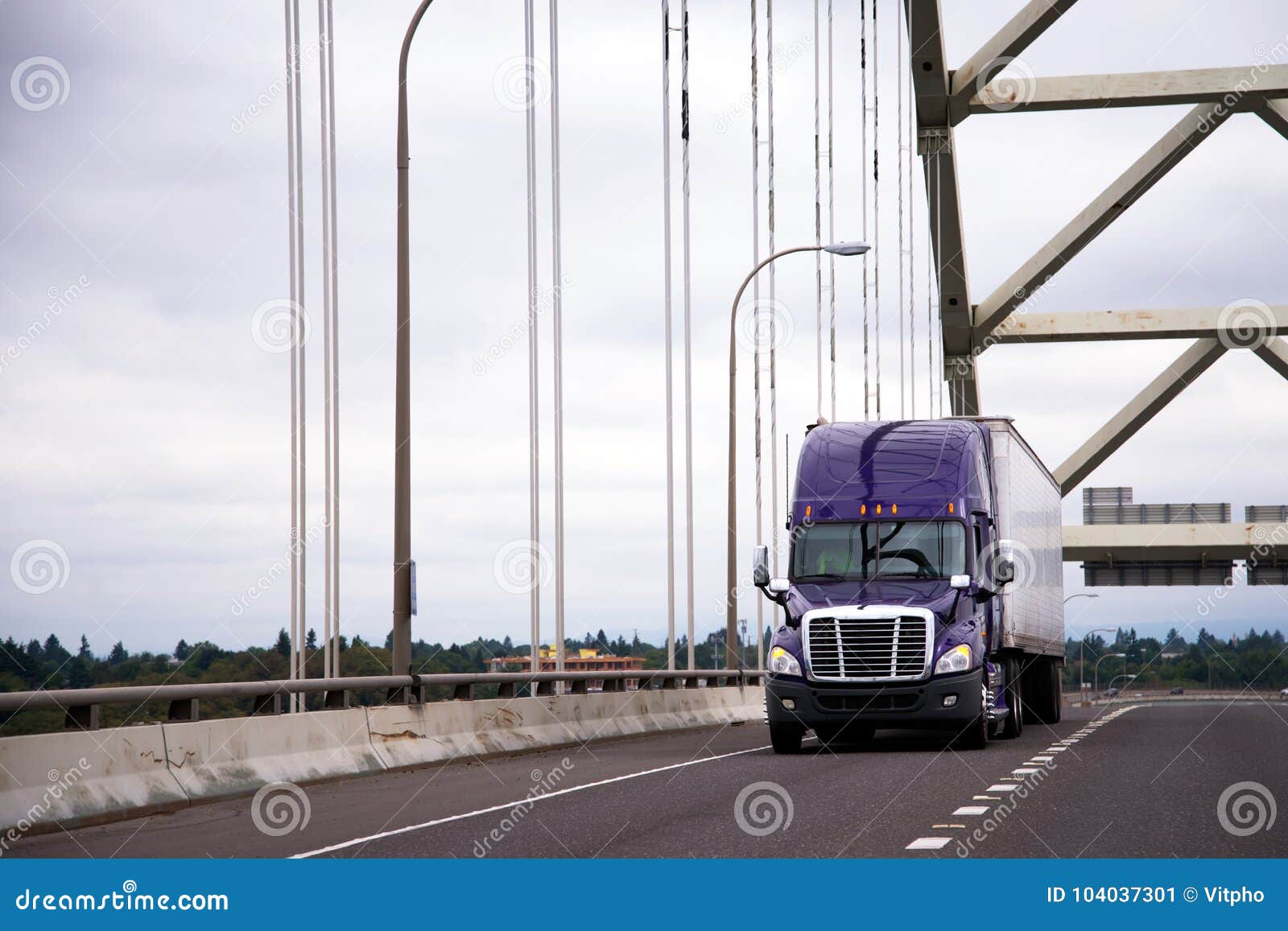 purple big rig semi truck with dry van trailer for long haul car